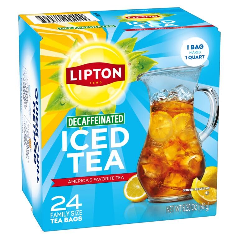 Amber-colored Lipton iced tea poured into a glass with condensation.