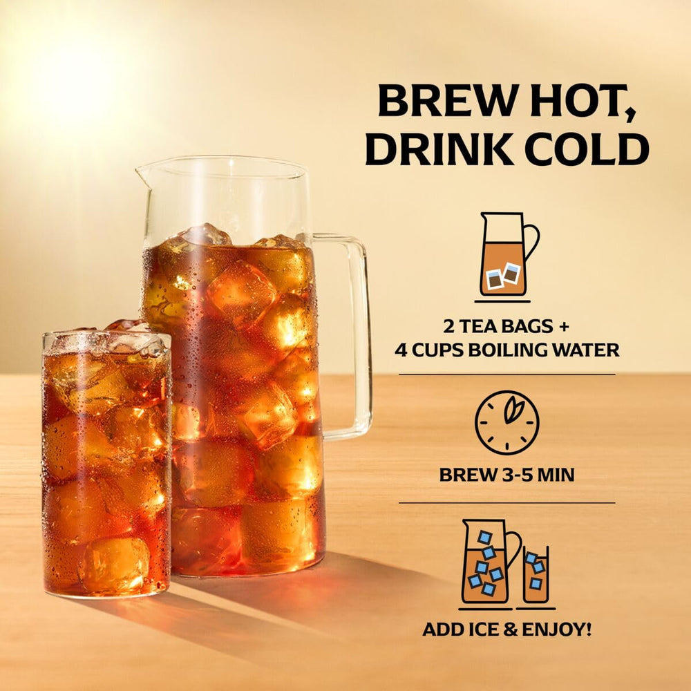Tall glass of Lipton decaf iced tea with a lemon wedge.
