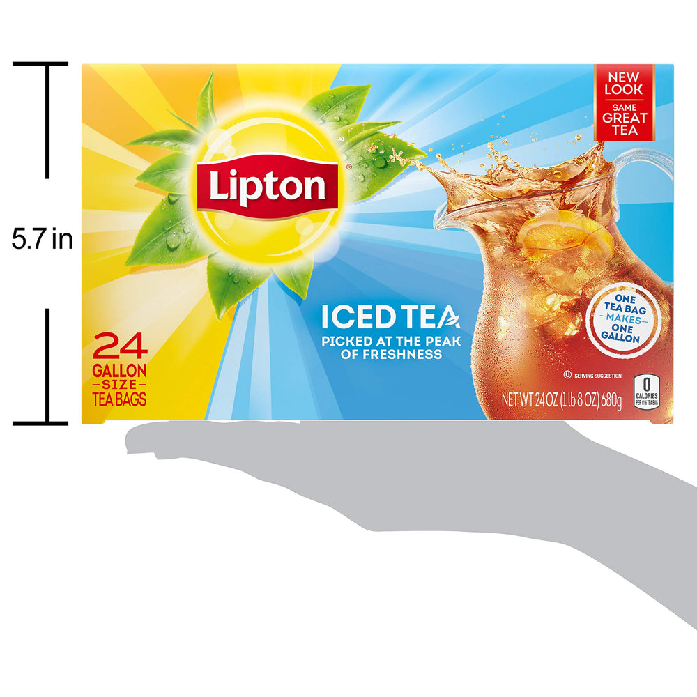 Lipton tea bag steeping in cup demonstrates quick flavor infusion.