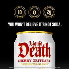 Liquid Death Cherry Obituary can beside a glass of sparkling water.