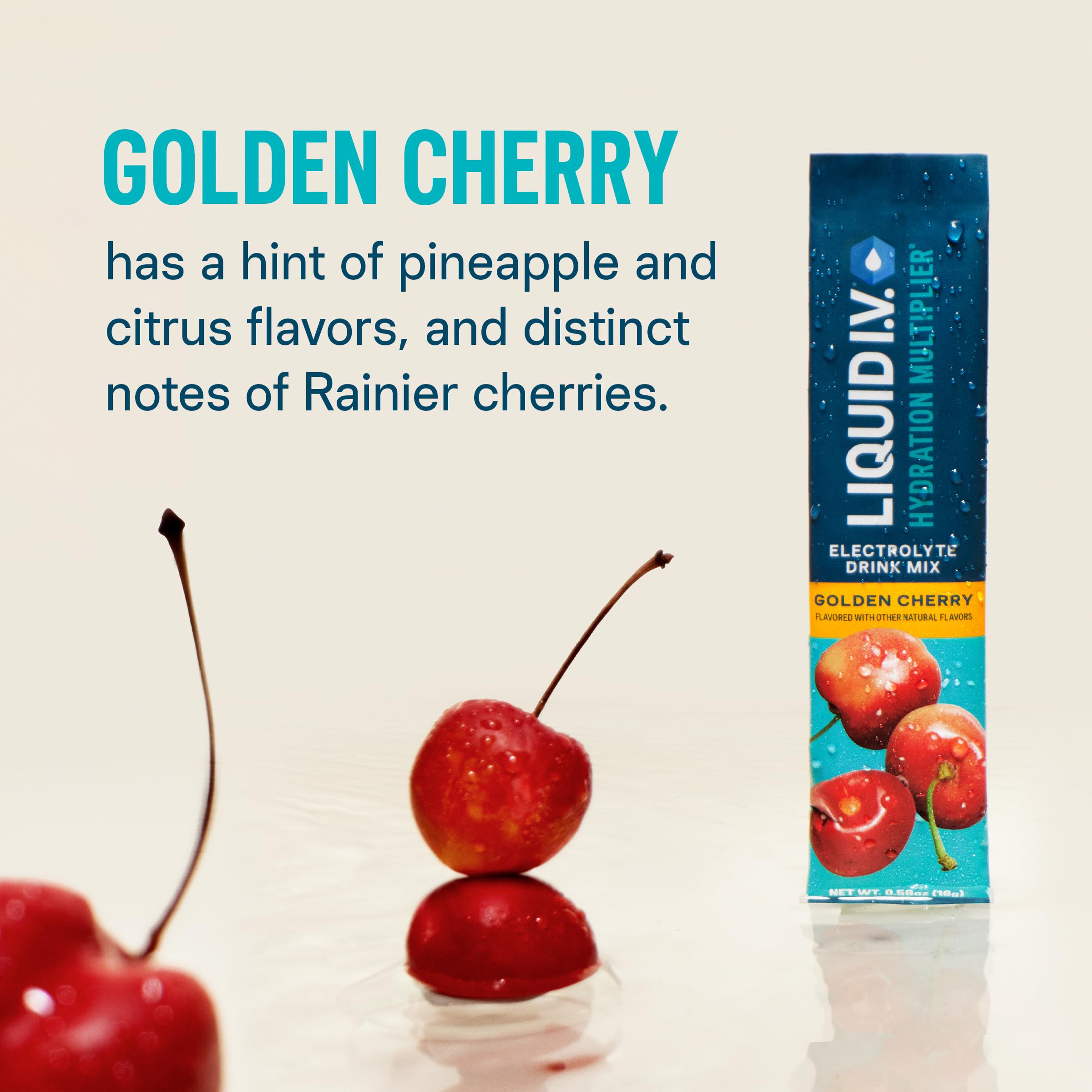 Glass of water with Golden Cherry Liquid I.V. ready to mix on the go.