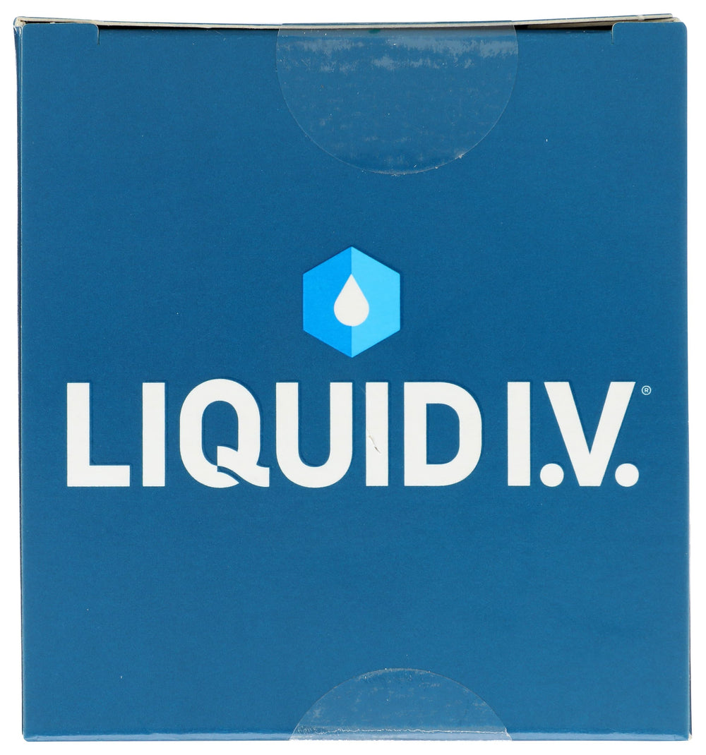Liquid I.V. Watermelon hydration mix powder dissolving in glass for quick hydration.