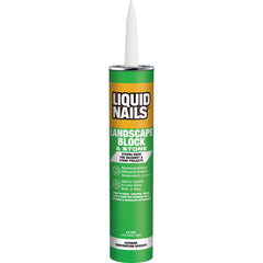 Liquid Nails LN-905 landscape adhesive bottle bonds blocks and stones for sturdy garden walls.