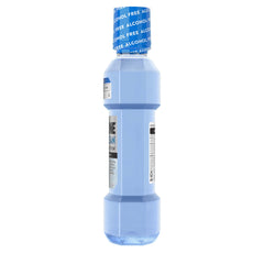 Listerine Ultraclean bottle pouring action showing easy dispensing.