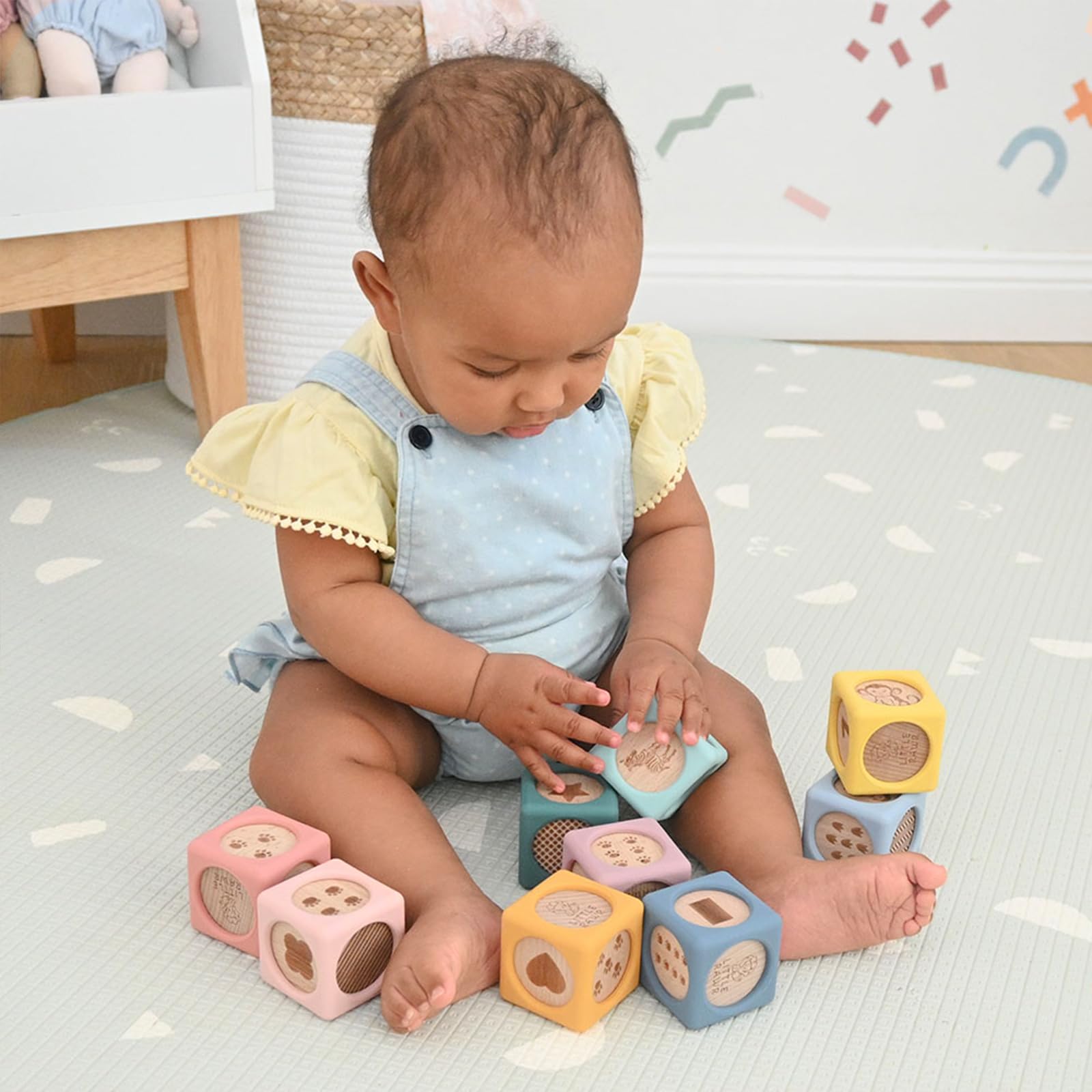 Little Rawr Montessori-inspired design encourages stacking, color recognition, and early motor skills.