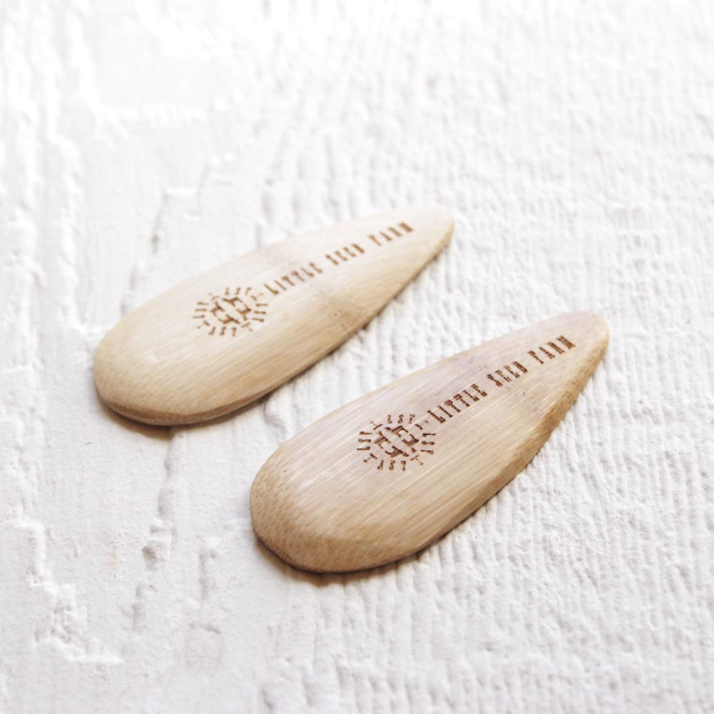Reusable bamboo applicator designed to pair with Little Seed Farm deodorant creams.