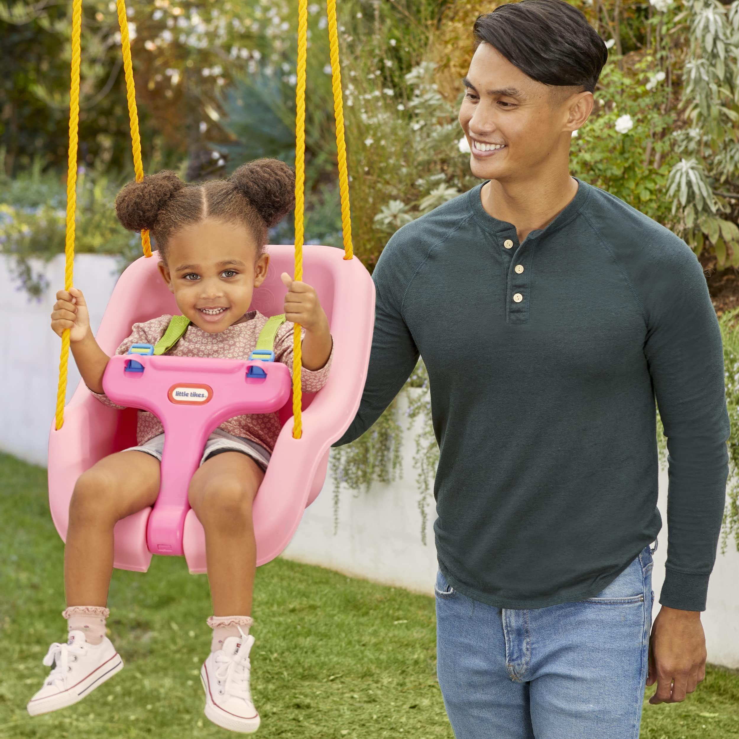  Convertible-seat swing from Little Tikes supports toddler use as the child grows.