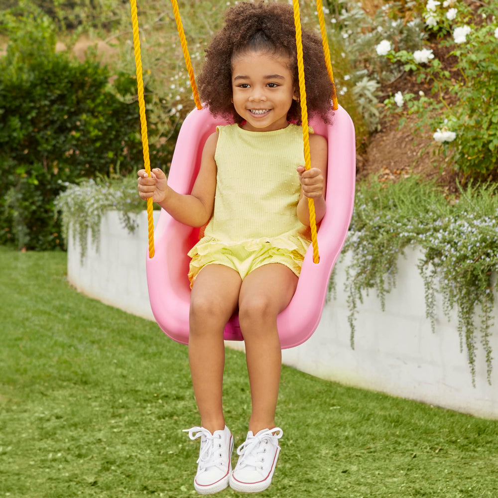 USA-made Little Tikes Snug 'n Secure Swing highlights quality construction for safe play.