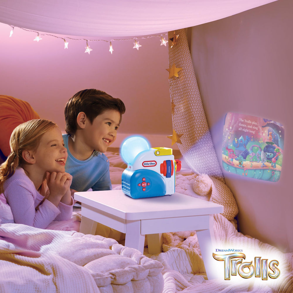 Little Tikes Story Dream Machine Trolls stories projected on wall with vivid colors.