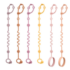 LittleHugs toy straps on a stroller keep belongings secure.