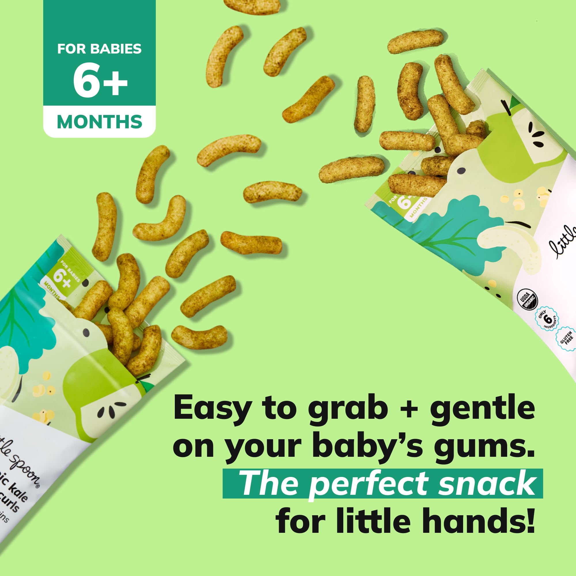 Little Spoon puffs being grasped by tiny hands, fostering self-feeding.