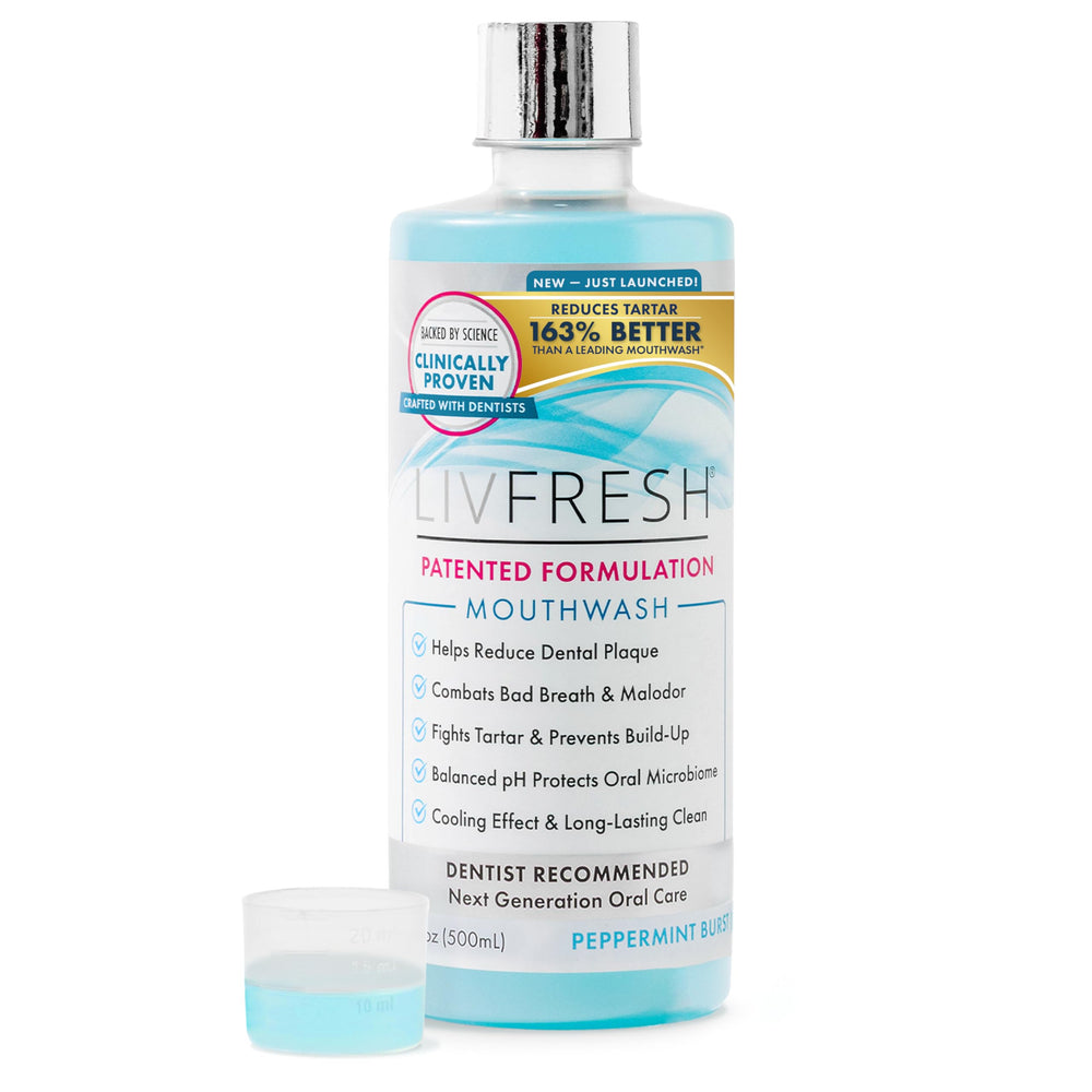 LIVFRESH mouthwash bottle being poured for a fresh breath boost.