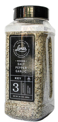 Livia’s Salt Pepper Garlic Seasoning bottle on the counter adds all-purpose flavor.