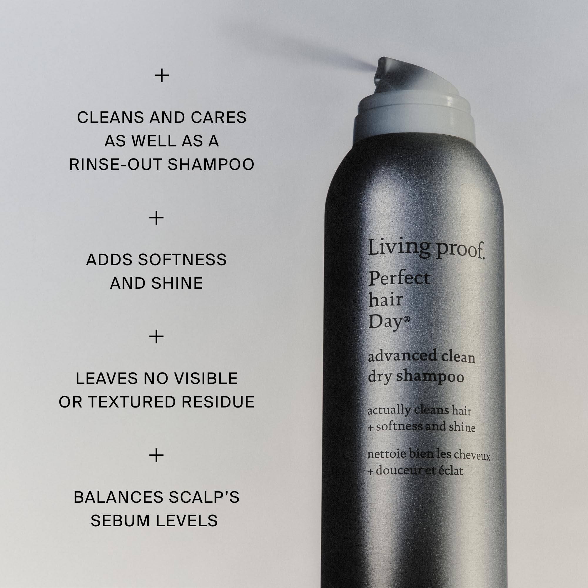 Living Proof phd dry shampoo applying to roots demonstrates easy root refresh.
