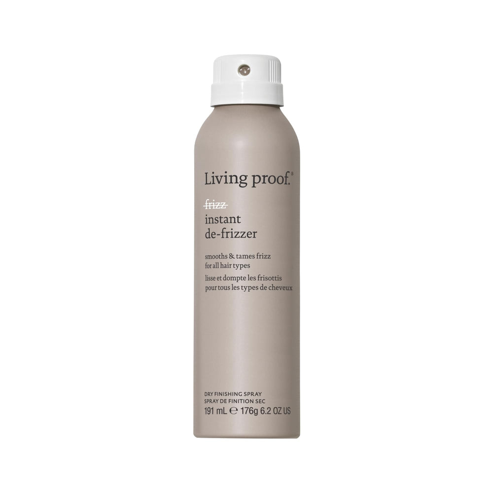 Living Proof No Frizz Instant De-Frizzer bottle close-up showing a conditioning spray that tames frizz