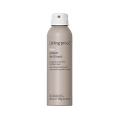 Living Proof No Frizz Instant De-Frizzer bottle close-up showing a conditioning spray that tames frizz