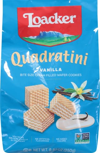 Loacker Quadratini vanilla wafers close-up shows creamy vanilla filling and crisp layers.
