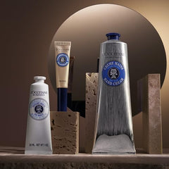 Close-up of brush applying oil to nails and cuticles.