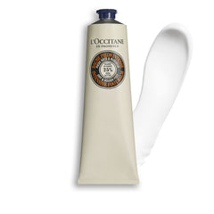L'Occitane foot balm texture as it is applied to dry feet for instant soothing.