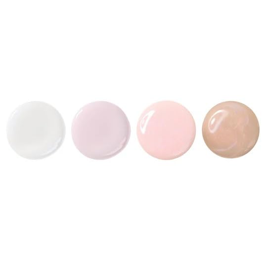 LONDONTOWN Illuminating Nail Concealer clean brush close-up for precise application.
