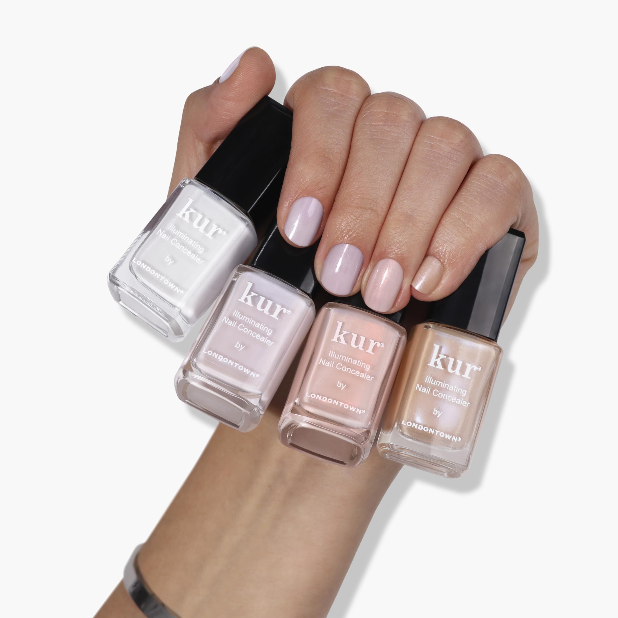 LONDONTOWN Illuminating Nail Concealer Pink swatch with rosy glow.