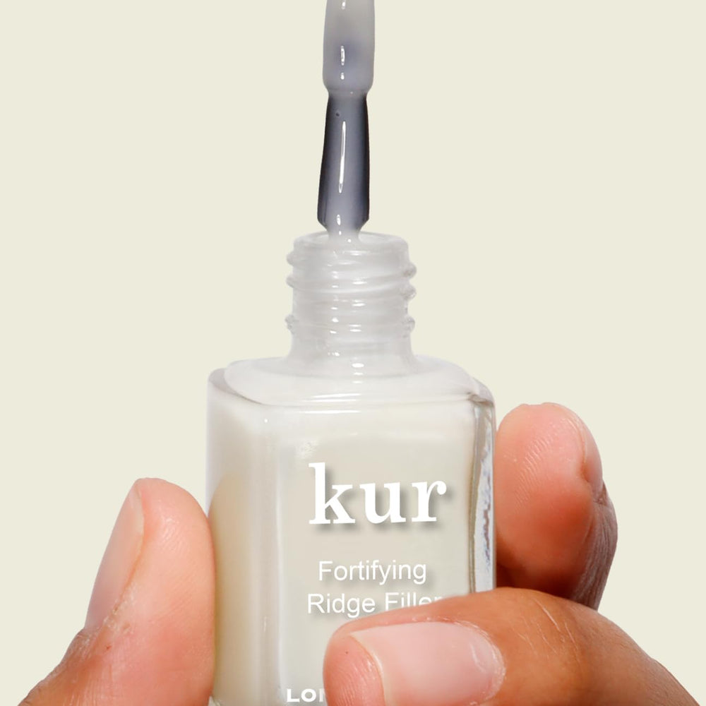 LONDONTOWN Kur nail primer application supports long-lasting color adhesion.