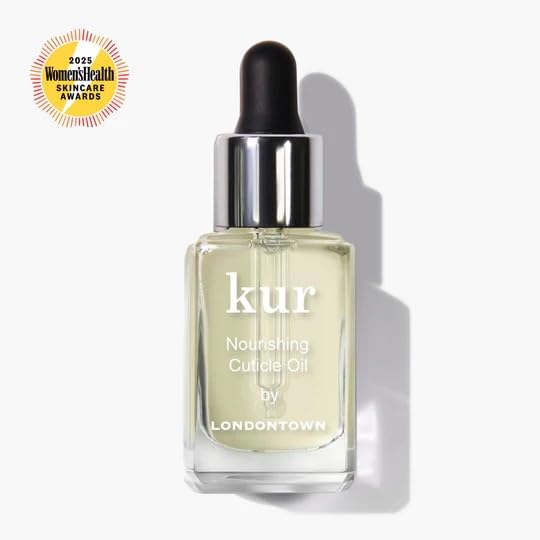 LONDONTOWN Nourishing Cuticle Oil dropper applies nourishing oil evenly to nails.