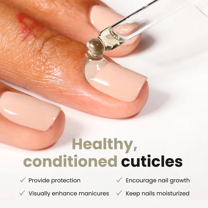 LONDONTOWN Nourishing Cuticle Oil bottle and dropper on a vanity.