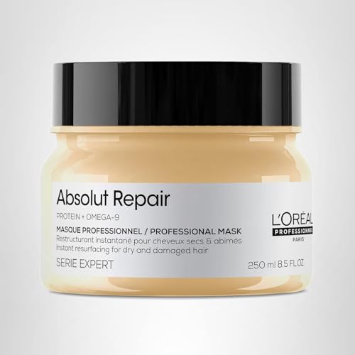 Application moment shows creamy mask being worked through damp hair