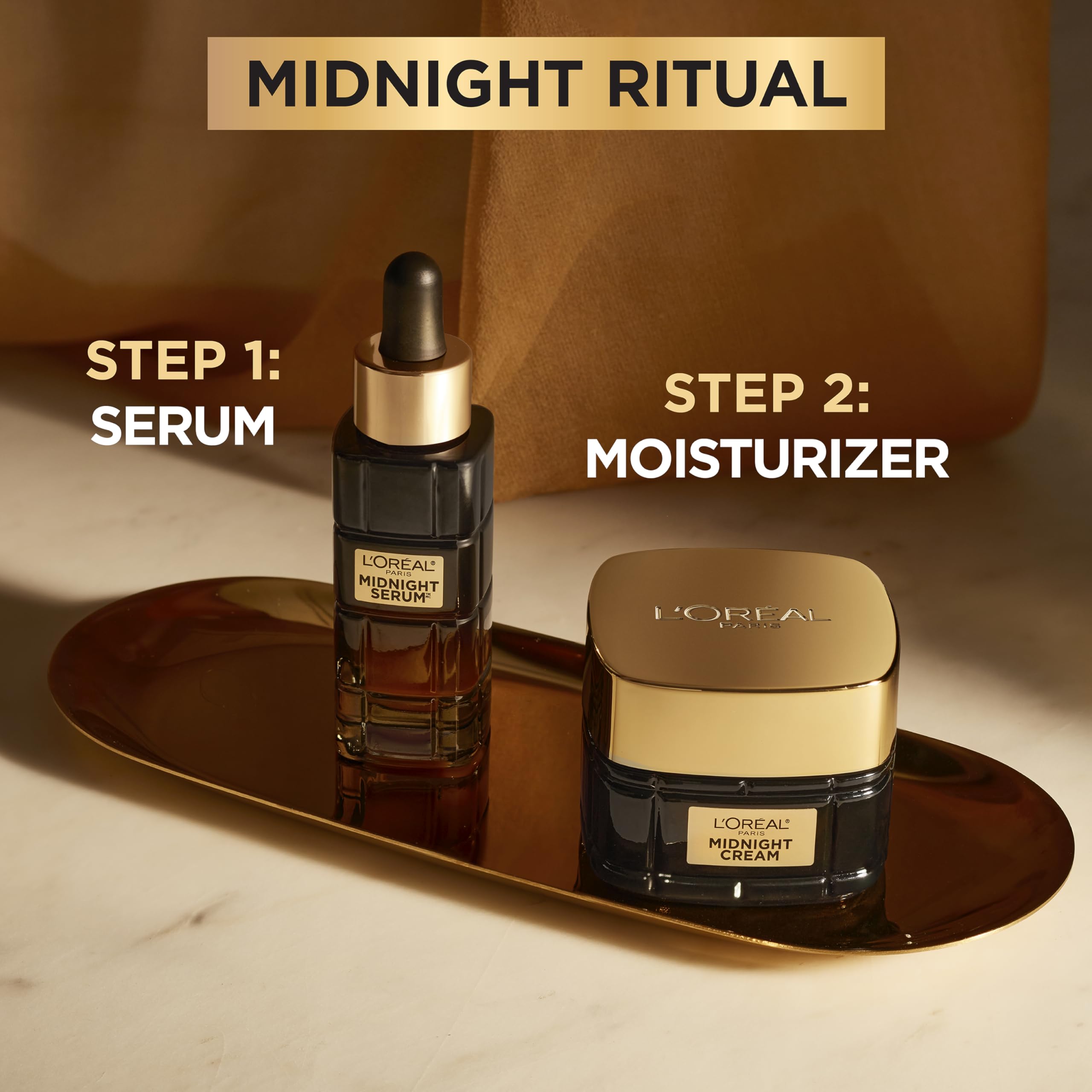 L'Oreal Paris Age Perfect Midnight Cream being applied to the face with a smooth finish