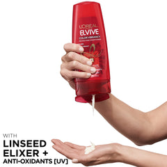 Elvive Color Vibrancy conditioner label close-up highlights Linseed Elixir benefits for color