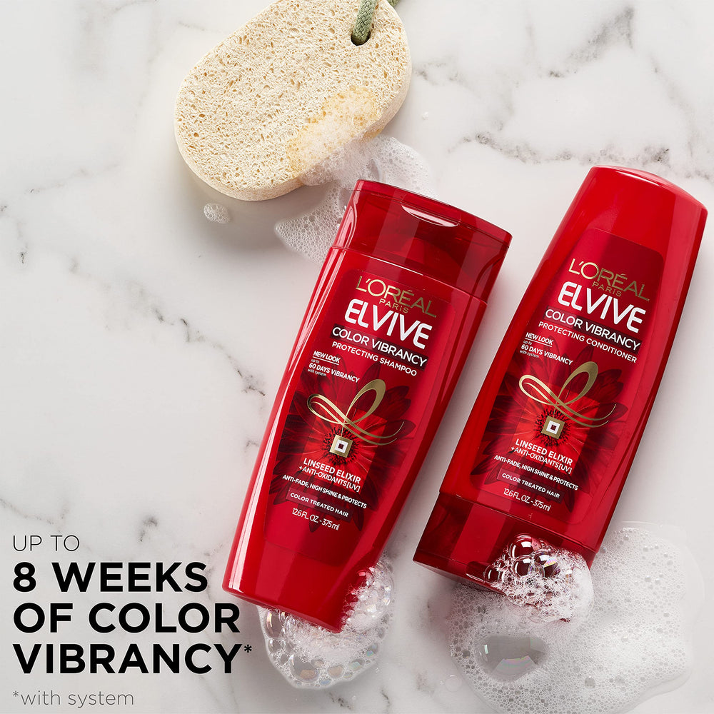 Elvive Color Vibrancy shampoo label close-up reveals anti-fade formula and floral scent
