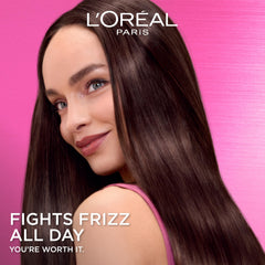 L'Oreal Paris EverPure Iron Sleek Coat mist closeup highlights even distribution on damp hair.
