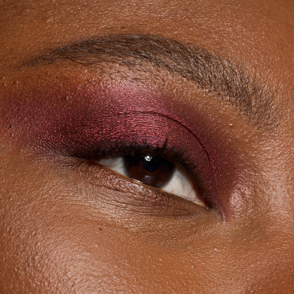 Display showing six matte and eight shimmer shades of Le Shadow Stick