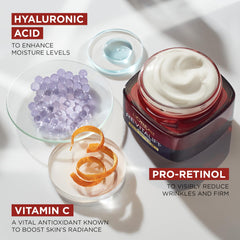 L'Oreal Paris Triple Power cream on skin demonstrates lightweight, non-greasy feel.