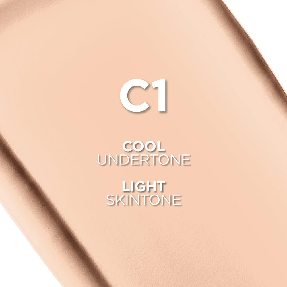 Close-up of True Match texture showing creamy, blendable formula for natural skin.