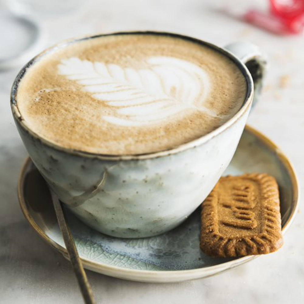 Lotus Biscoff cookies during a tea-time moment with a warm beverage.