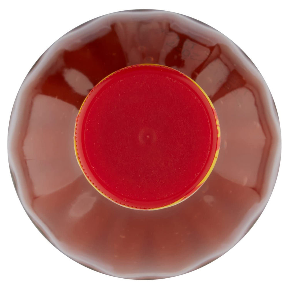Louisiana Original Hot Sauce being poured to add heat and brightness