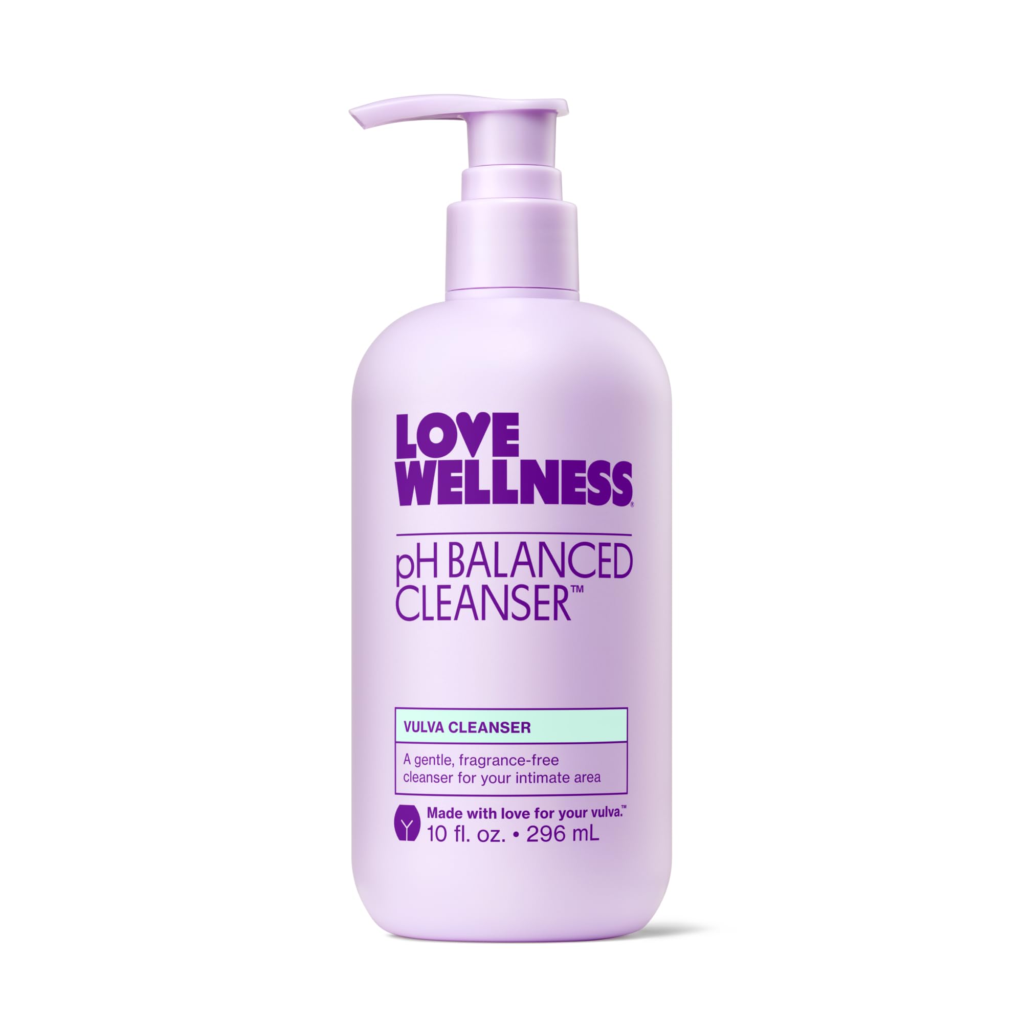 Love Wellness pH Balancing Cleanser bottle on bathroom shelf, fragrance-free and gentle for sensitive skin.