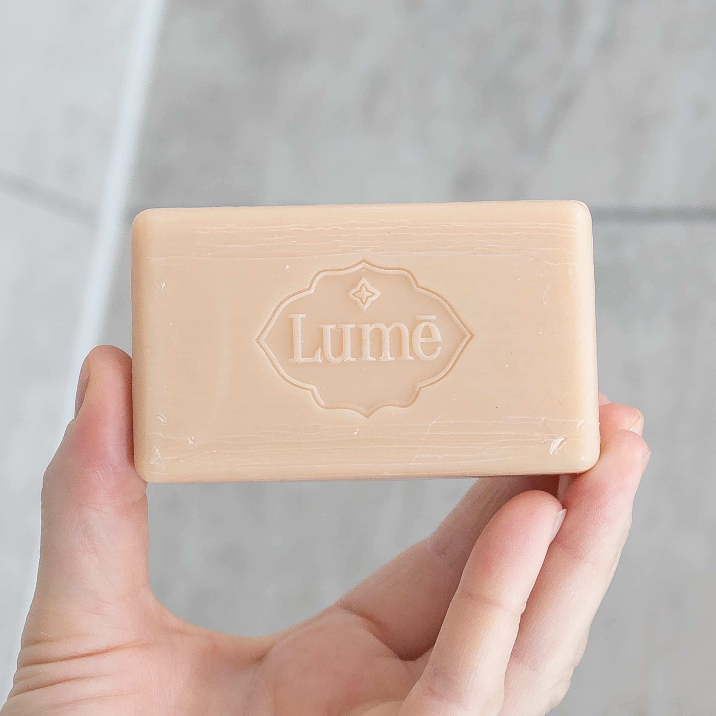 Lume bar soap odor-prone areas safe close-up indicates comprehensive cleansing.