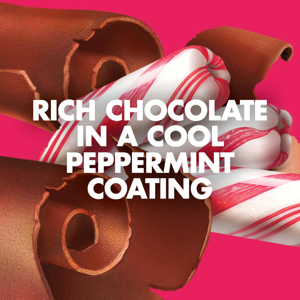 LUNA Bar Chocolate Peppermint Stick held in hand, ready for a quick snack.