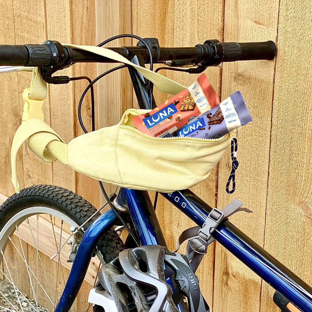 Luna Bar plant-based protein content close-up, 8-9g, on-the-go fueling.