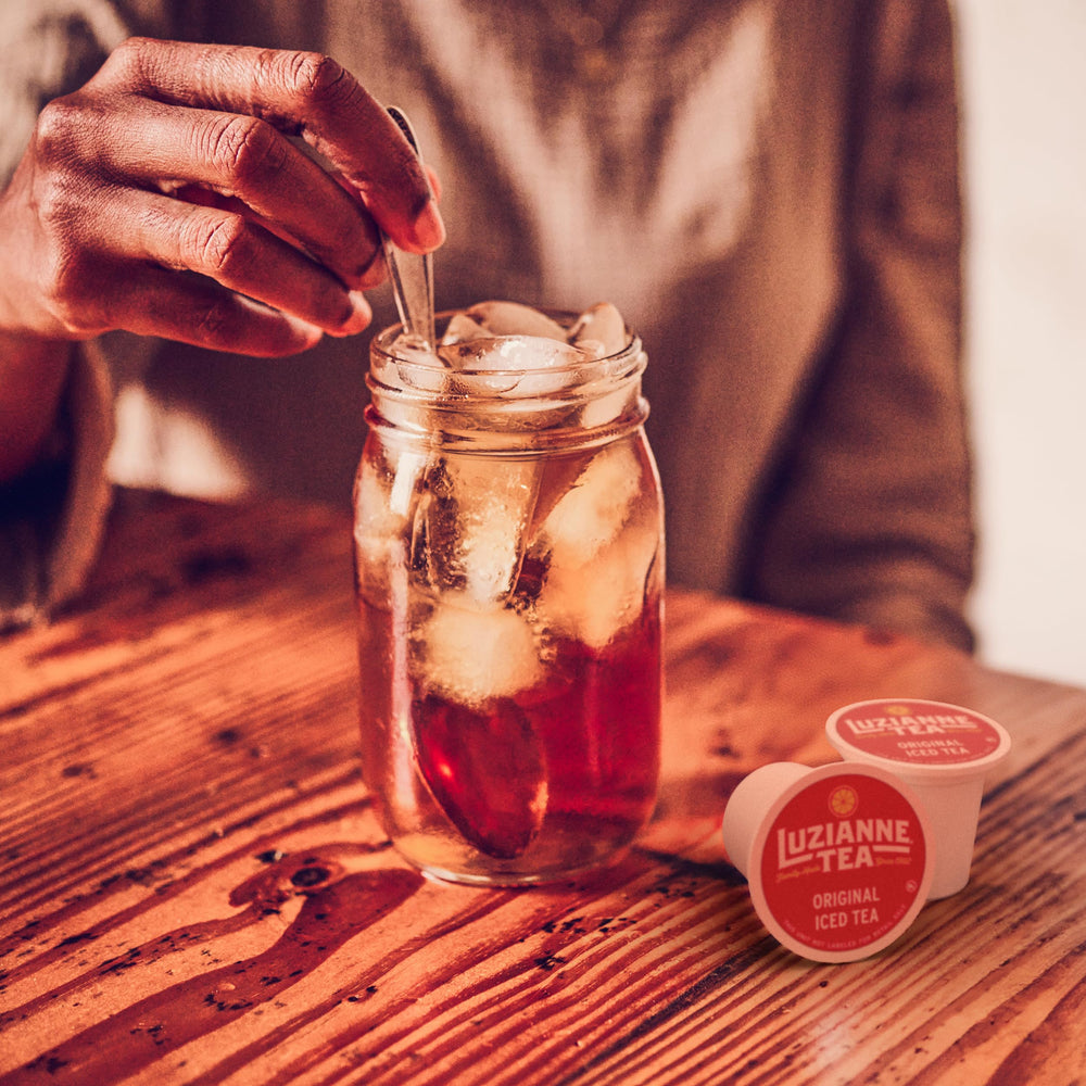 A chilled glass of Luzianne iced tea freshly poured from the pod brew