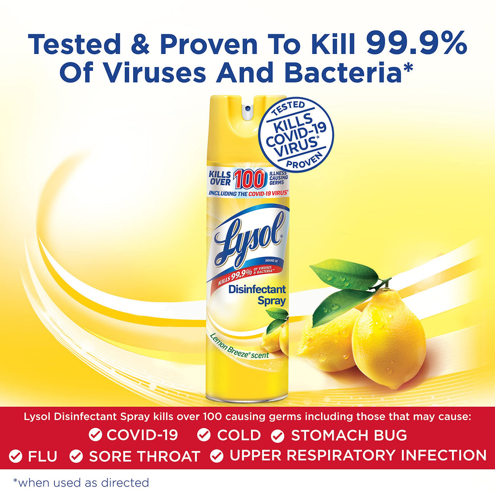 Lysol Disinfectant Spray Lemon Breeze mist dispersing onto a surface.