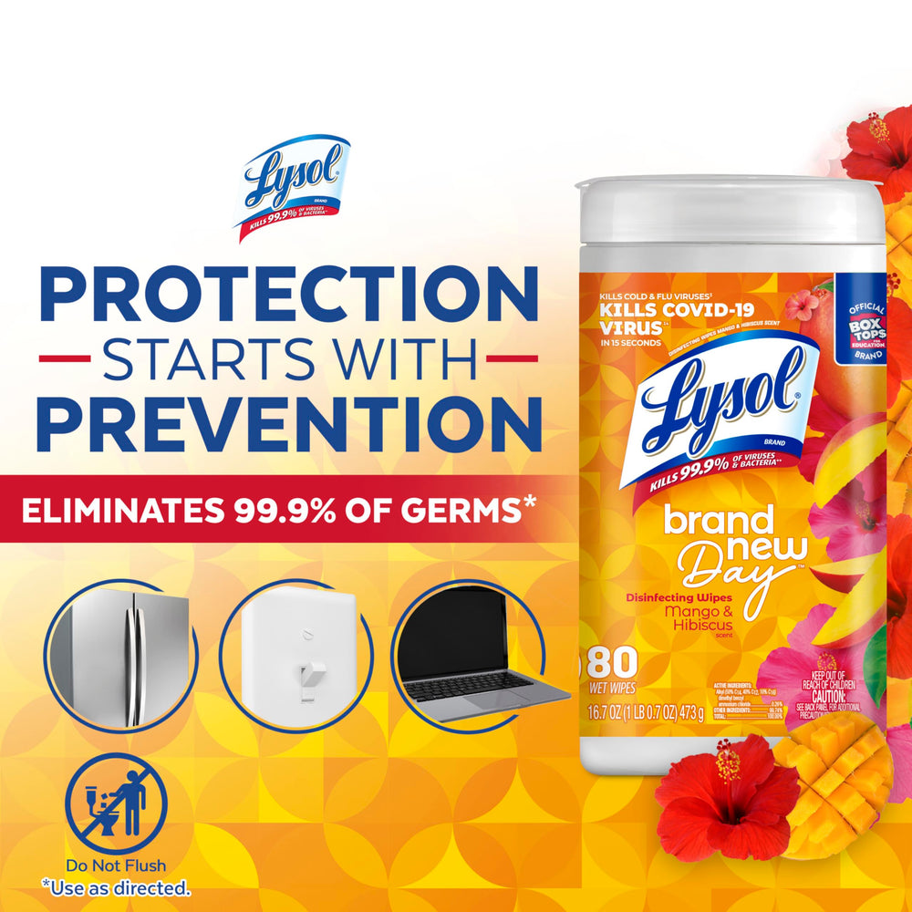 Lysol Mango Hibiscus wipes beside a computer keyboard for surface disinfection