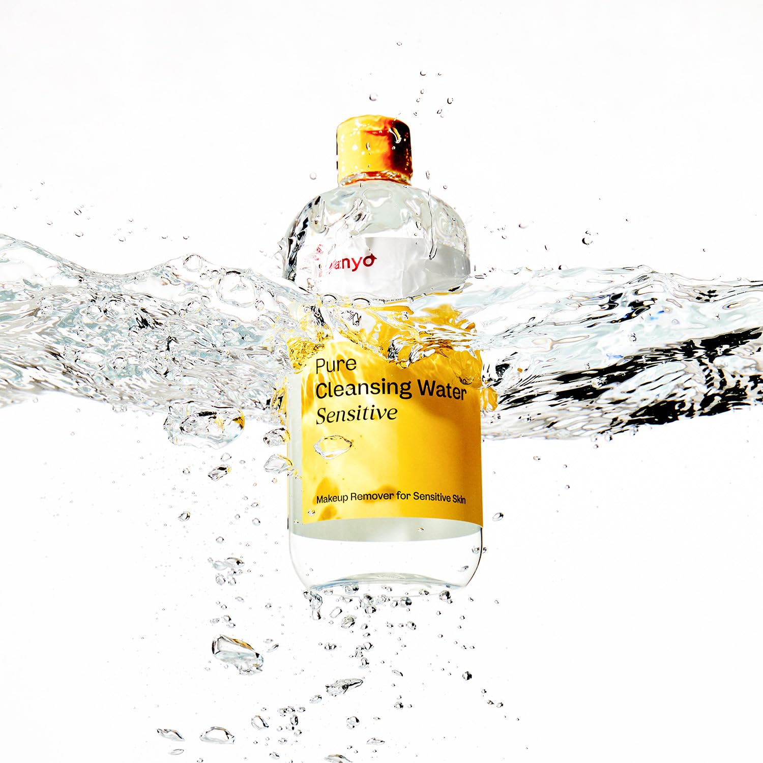 Ma:nyo Pure Cleansing Water soothes skin, showcasing a calming skincare moment.
