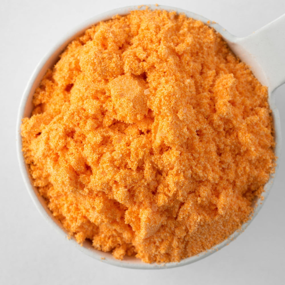 Popcorn tossed with Mac Yourself cheese powder for a savory snack.