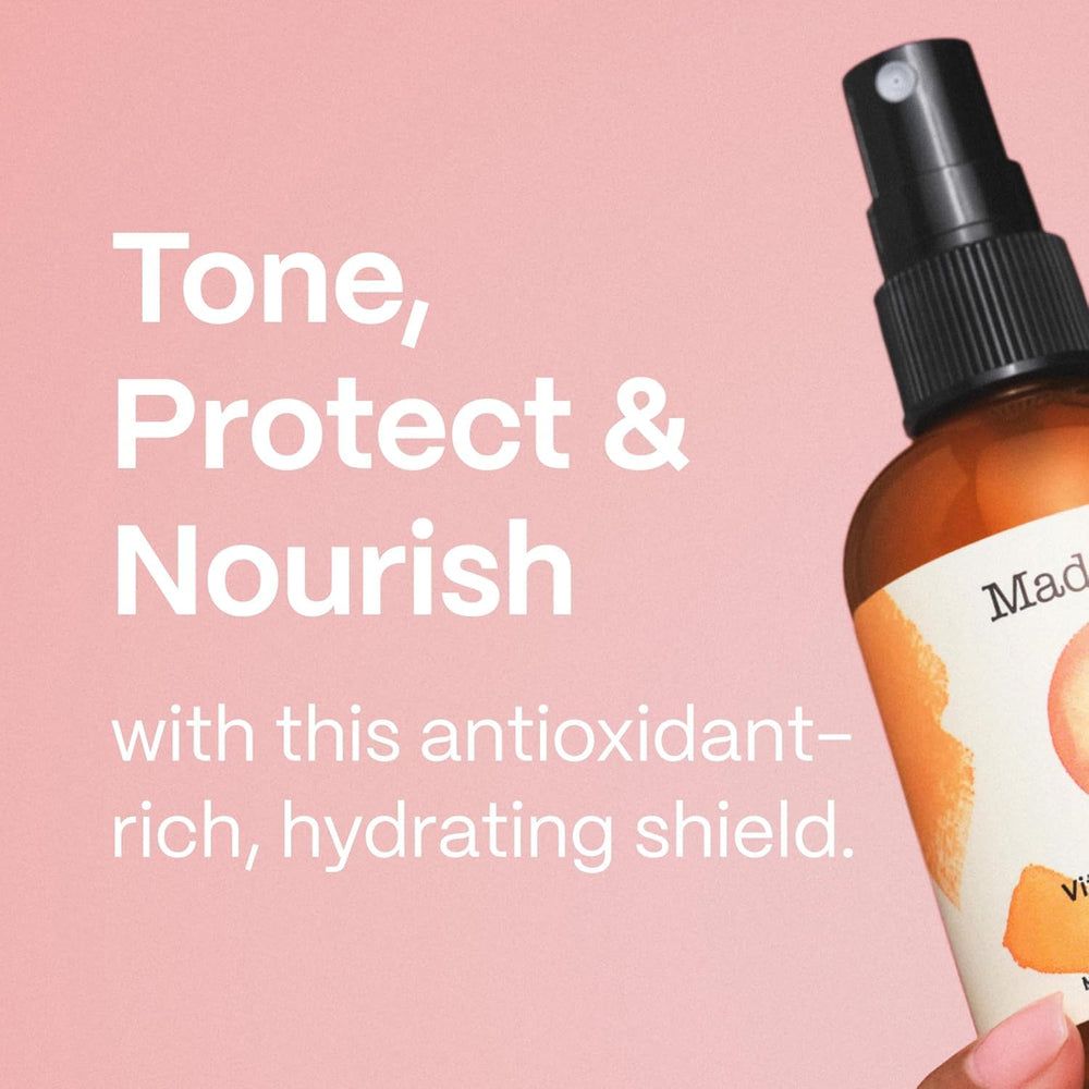 Mad Hippie Vitamin C Toning Mist applied on neck and chest