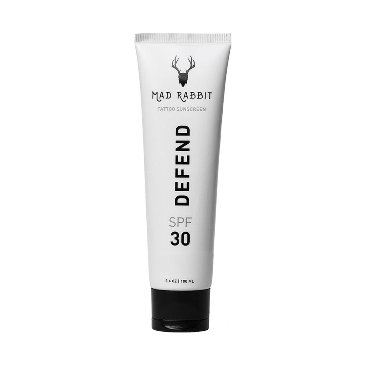 Mad Rabbit Defend sunscreen tube packaging showing mineral protection for tattoos.
