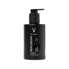 Mad Rabbit Replenish tattoo body lotion bottle on a clean surface for daily hydration